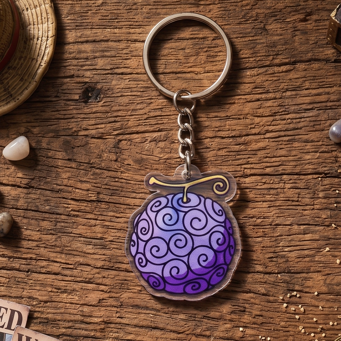 Gomu Gomu no Mi Devil Fruit acrylic keychain from One Piece held in hand